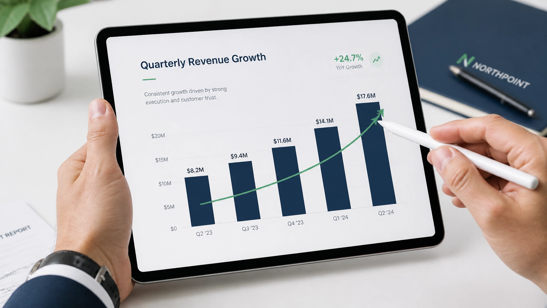 Close-up of professional hands holding a stylus and pointing at a digital tablet showing a clear growth chart.